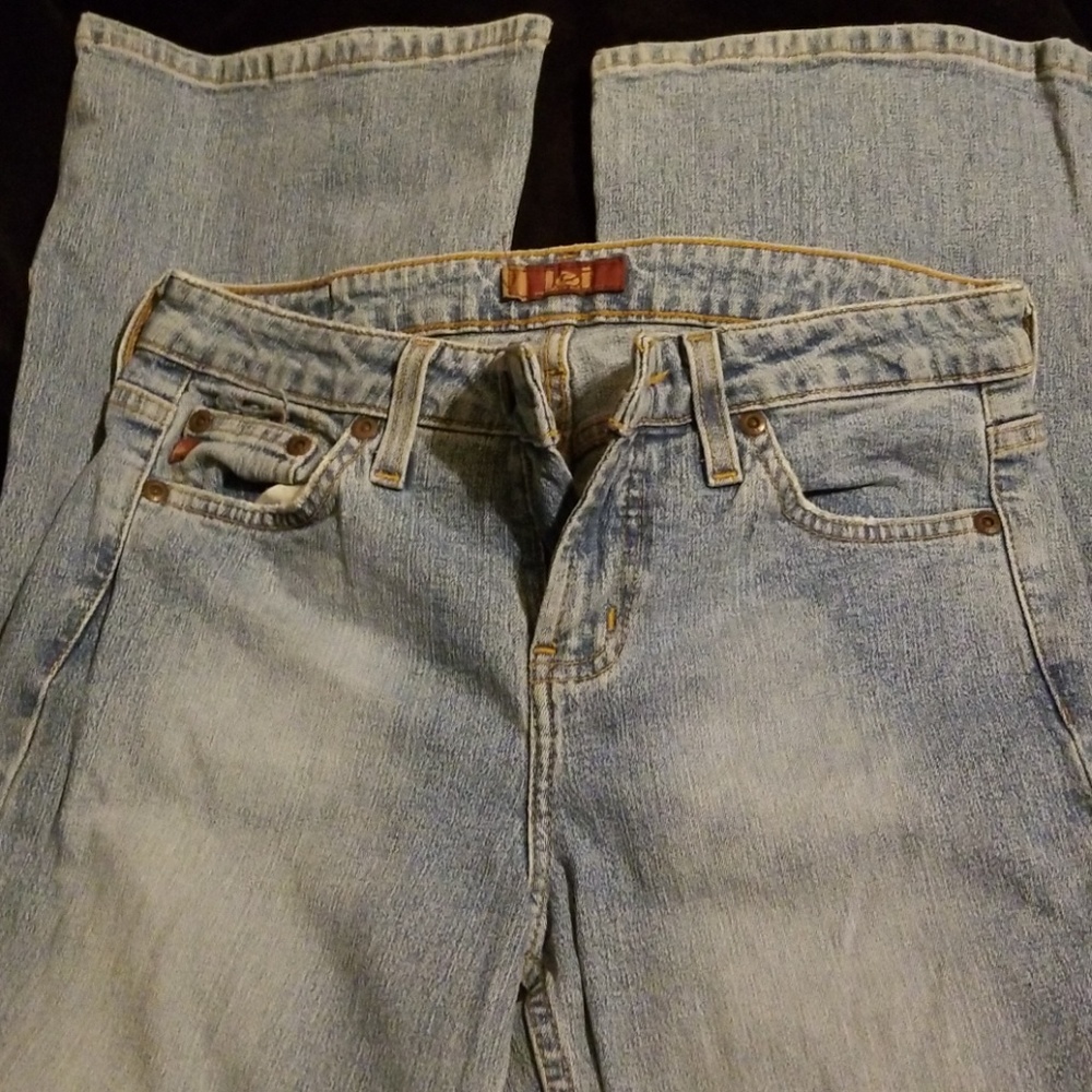 Boot cut button pocket jean